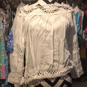 White Lacey eyelet trim. On or off shoulder bow